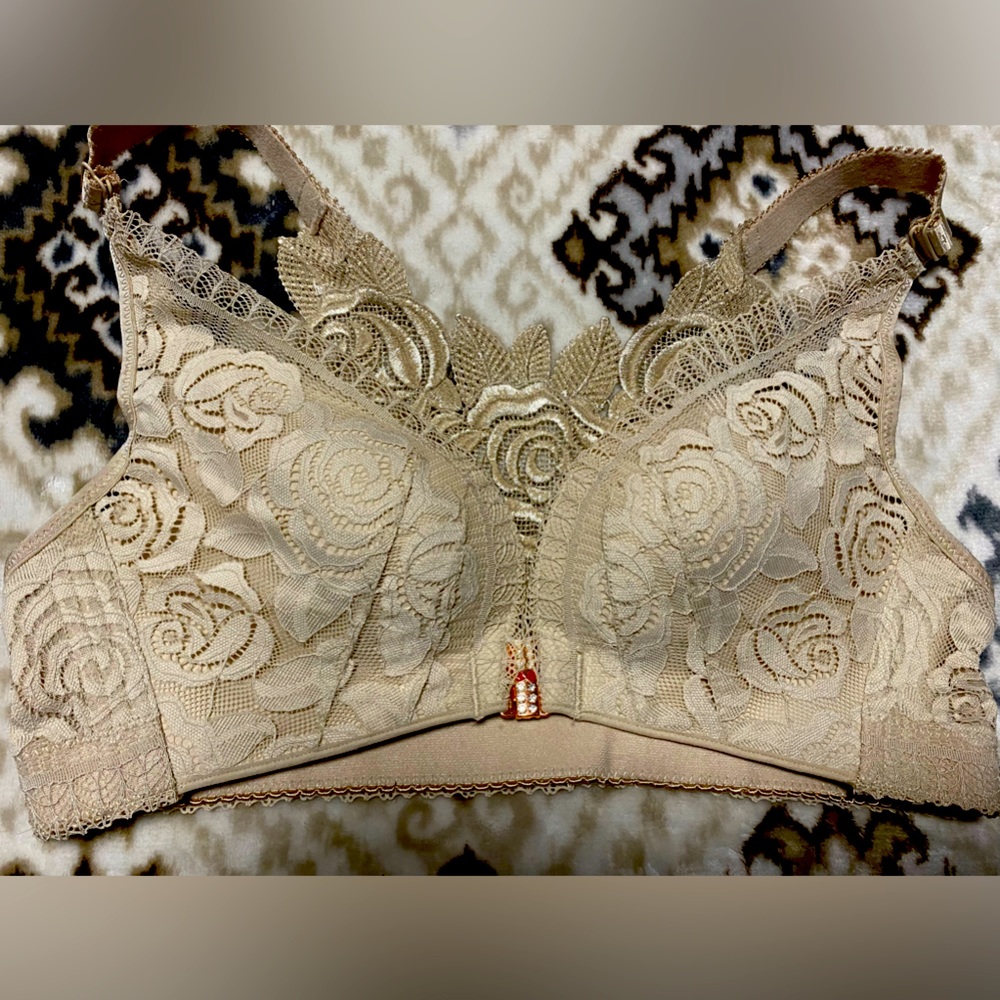 New Size 36 designer bra with decorative clasp on front & rose design on back.